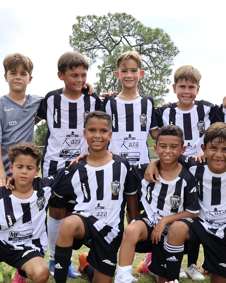 Team photo in striped jerseys