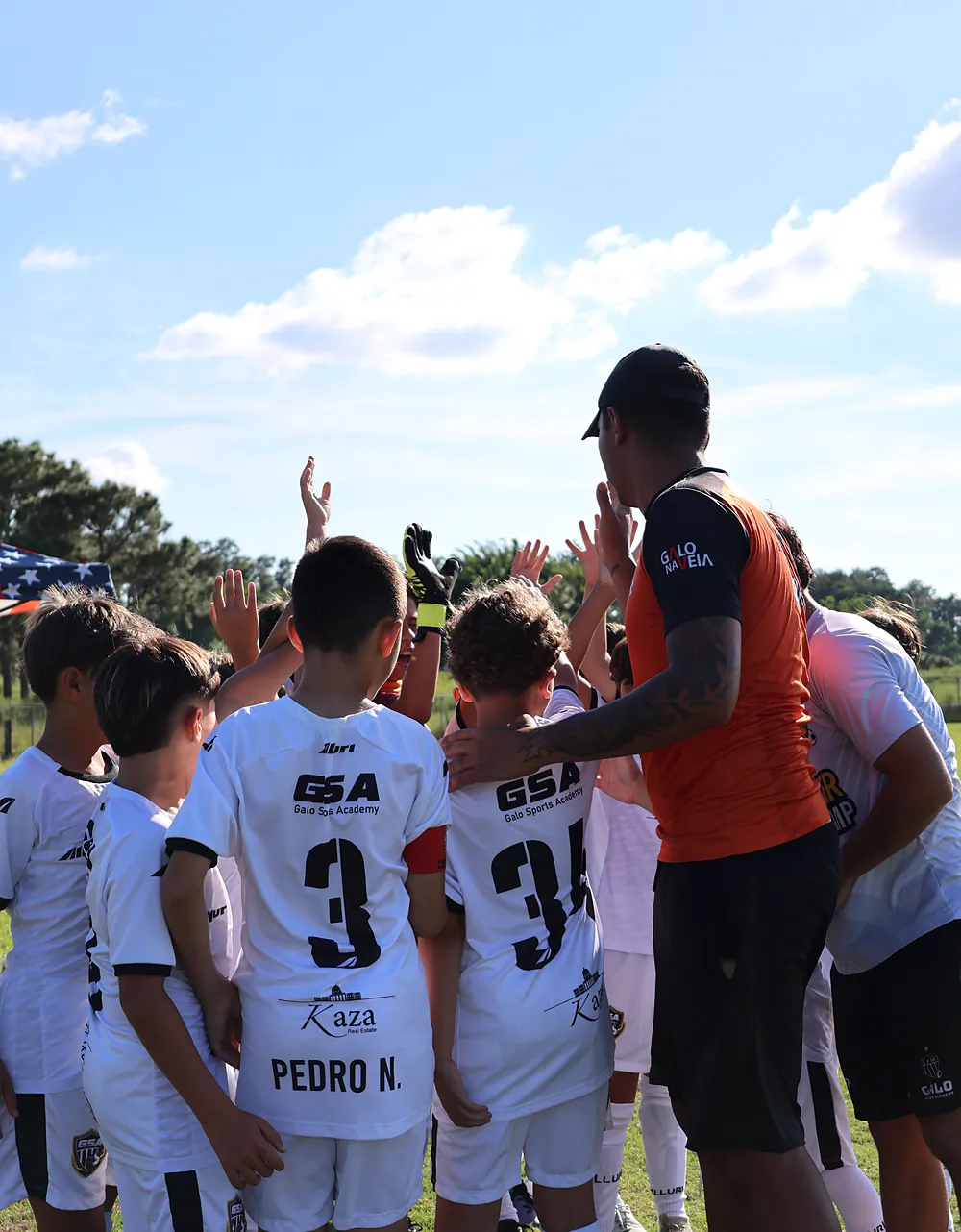 Coach high-fiving the players